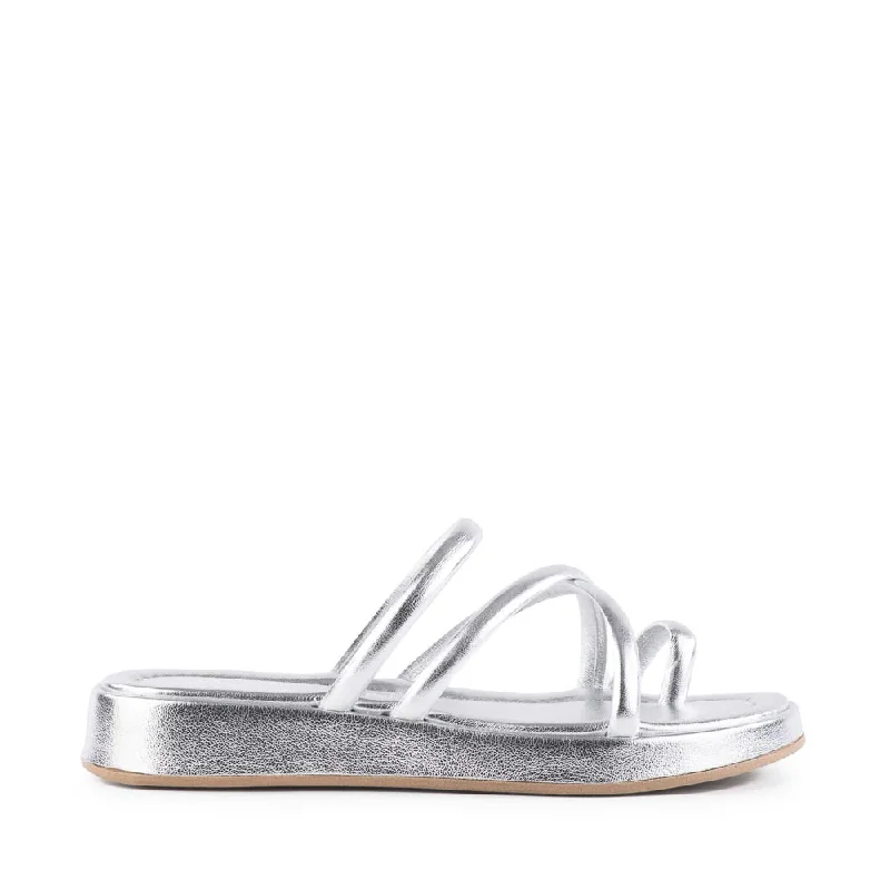 Women's Flat Slide Sandals with a Memory Foam Insole in White for All - Day ComfortRule The World Sandal in Silver from Seychelles Women's Flat Slide Sandals with a Memory Foam Insole in White for All - Day ComfortRule The World Sandal in Silver from Seychelles