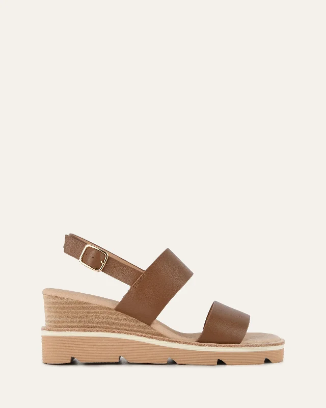 Women's Sandals with a Floral - Printed Upper in Pink for a Feminine Spring Look Women's Sandals with a Floral - Printed Upper in Pink for a Feminine Spring Look Women's Sandals with a Glitter - Coated Strap in Gold for a Sparkly Summer OutfitKINNEY WEDGE SANDAL DARK TAN LEATHER Women's Sandals with a Floral - Printed Upper in Pink for a Feminine Spring Look Women's Sandals with a Floral - Printed Upper in Pink for a Feminine Spring Look Women's Sandals with a Glitter - Coated Strap in Gold for a Sparkly Summer OutfitKINNEY WEDGE SANDAL DARK TAN LEATHER
