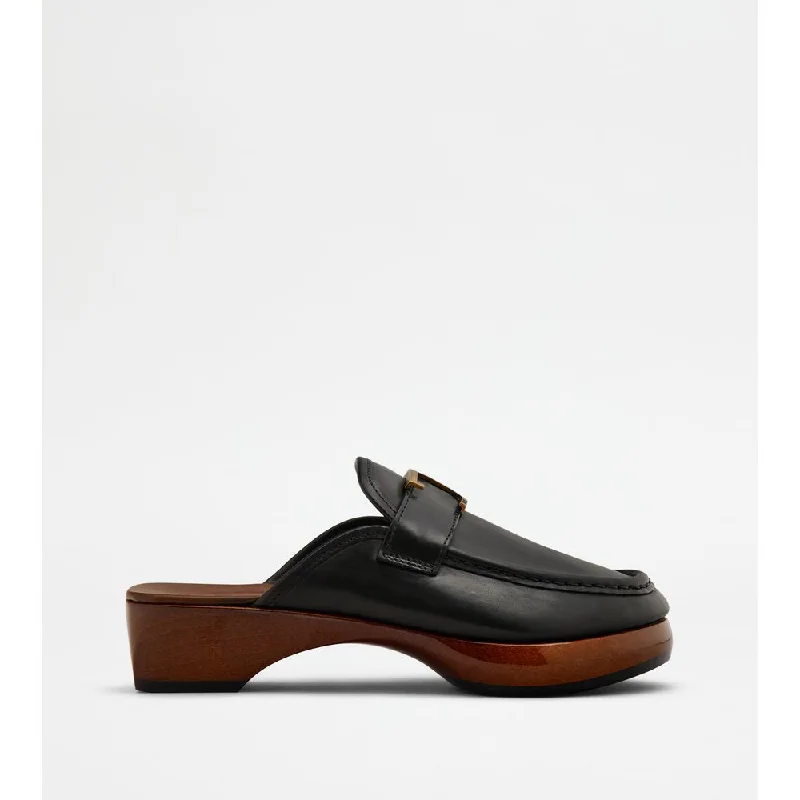Women's Sneakers with Hidden Wedges for a Subtle Height Boost and Added StyleMules in Leather Women's Sneakers with Hidden Wedges for a Subtle Height Boost and Added StyleMules in Leather
