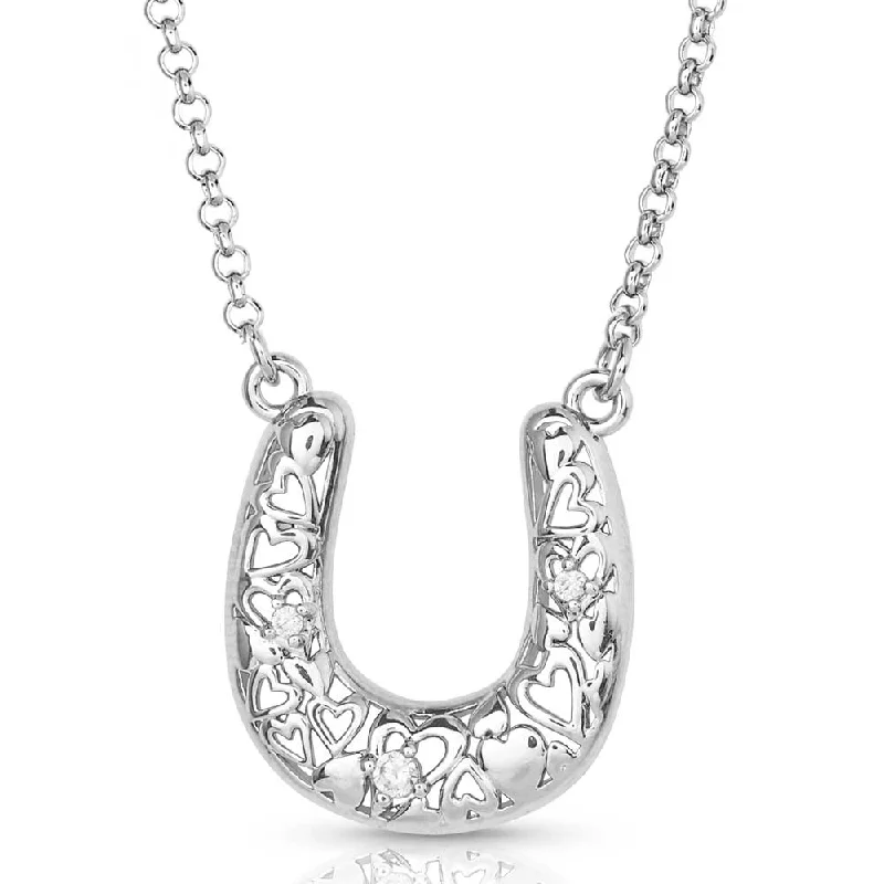 women's lace-up moto bootsMontana Silversmiths Heartfelt Luck Horseshoe Necklace